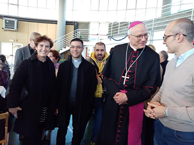 Monsignor Baturi al «Pranzo della Solidarietà» Nella palestra della Casa di riposo di Terramaini